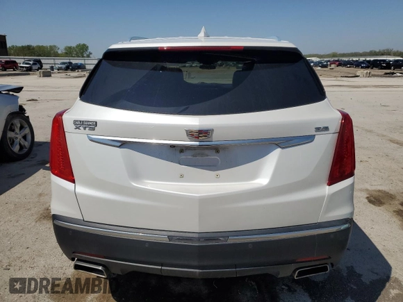 2017 Cadillac XT5 FWD z VIN 1GYKNARS3HZ297366, wystawiony jako Copart lot #53908815 z przebiegiem 95 834 mil mil oraz Szkoda całkowita • Salvage title. Historia ofert i sprzedaży dostępna na DreamBid. Obrazek 6.
