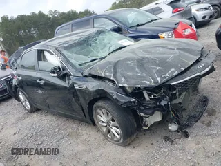 2018 Kia Optima LX z VIN 5XXGT4L33JG267863, wystawiony jako IAAI lot #41948493 z przebiegiem 71 123 mil mil oraz . Historia ofert i sprzedaży dostępna na DreamBid. Obrazek 13.