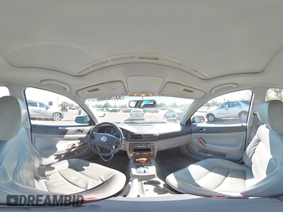 2002 Volkswagen Passat GLX z VIN WVWTH63B72P066013, wystawiony jako Copart lot #53750585 z przebiegiem 114 175 mil mil oraz Szkoda całkowita • Salvage title. Historia ofert i sprzedaży dostępna na DreamBid. Obrazek 14.