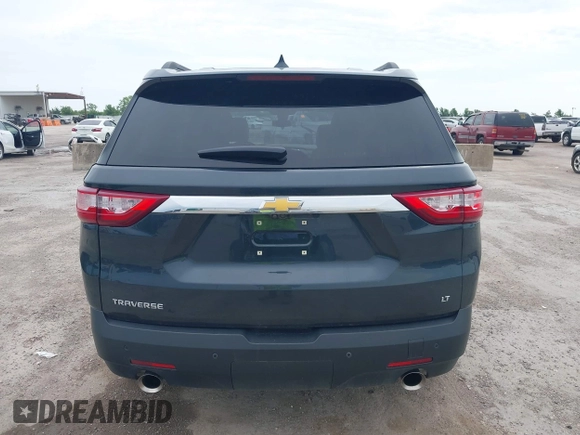 2021 Chevrolet Traverse LT with VIN 1GNERHKW4MJ191814, listed as a IAAI auction lot 42185544 with 87,493 mi miles and . Bid and sale history available at DreamBid. Image 16.
