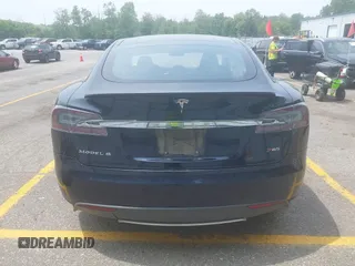 2013 Tesla Model S Performance z VIN 5YJSA1CP1DFP21827, wystawiony jako IAAI lot #42494897 z przebiegiem 148 150 mil mil oraz . Historia ofert i sprzedaży dostępna na DreamBid. Obrazek 17.