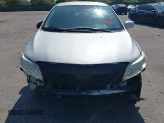 2010 Toyota Corolla with VIN 1NXBU4EE2AZ240438, listed as a IAAI auction lot 42125407 with 185,253 mi miles and . Bid and sale history available at DreamBid. Image 6.