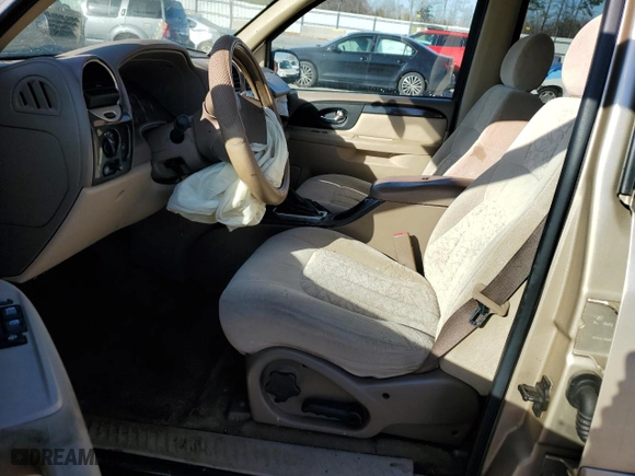 2004 GMC Envoy SLT with VIN 1GKDS13S442209545, listed as a Copart auction lot 84736874 with 255,371 mi miles and Salvage Title. Bid and sale history available at carsss.com. Image 7.