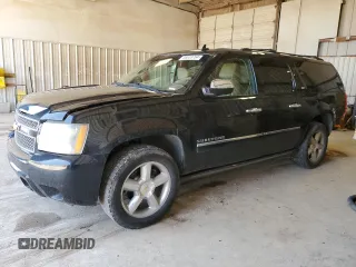 2010 Chevrolet Suburban LTZ with VIN 1GNUCKE09AR146804, listed as a Copart auction lot 56639764 with 210,705 mi miles and Salvage Title. Bid and sale history available at carsss.com. Image 1.