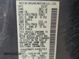 2007 Nissan Frontier SE with VIN 1N6AD09W07C448292, listed as a Copart auction lot 55821795 with 311,852 mi miles and Clean title. Bid and sale history available at DreamBid. Image 12.