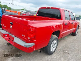 2007 Dodge Dakota SLT with VIN 1D7HE48K17S103188, listed as a IAAI auction lot 42187066 with 113,061 mi miles and . Bid and sale history available at carsss.com. Image 6.