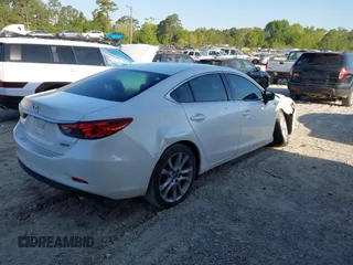 2014 Mazda Mazda6 i Touring with VIN JM1GJ1V65E1117072, listed as a IAAI auction lot 42060743 with 181,524 mi miles. Bid and sale history available at carsss.com. Image 4.