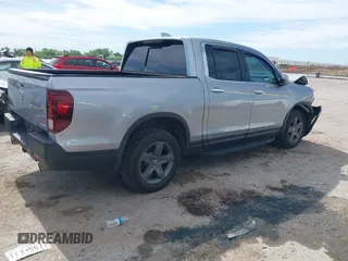 2021 Honda Ridgeline RTL-E с VIN 5FPYK3F70MB025806, выставлен на аукционе IAAI как лот 42311667 с пробегом 30 143 миль миль и . История ставок и продаж доступна на DreamBid. Изображение 4.