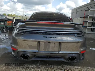 2022 Porsche 911 Turbo S z VIN WP0AD2A91NS255589, wystawiony jako Copart lot #60695644 z przebiegiem 6 562 mil mil oraz Nie do naprawy • Non repairable. Historia ofert i sprzedaży dostępna na DreamBid. Obrazek 6.
