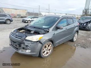 2014 Ford Escape Titanium with VIN 1FMCU9J97EUD26523, listed as a IAAI auction lot 41919727 with NaN miles. Bid and sale history available at carsss.com. Image 18.
