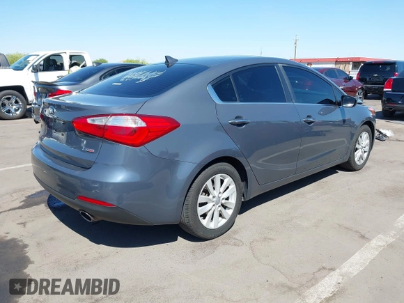 2014 Kia Forte EX with VIN KNAFX4A84E5112910, listed as a IAAI auction lot 42039761 with 118,126 mi miles. Bid and sale history available at carsss.com. Image 4.
