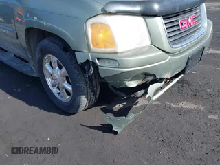 2004 GMC Envoy SLE with VIN 1GKDT13S942254932, listed as a IAAI auction lot 41509407 with 213,068 mi miles. Bid and sale history available at carsss.com. Image 6.
