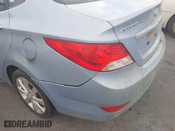 2013 Hyundai Accent GLS with VIN KMHCU4AE8DU583303, listed as a IAAI auction lot 42504235 with 113,992 mi miles and . Bid and sale history available at DreamBid. Image 6.