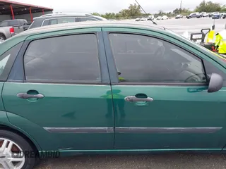 2000 Ford Focus LX with VIN 1FAFP33P8YW336316, listed as a IAAI auction lot 41904496 with 215,100 mi miles and . Bid and sale history available at carsss.com. Image 14.