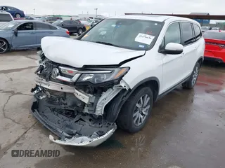 2021 Honda Pilot EX-L with VIN 5FNYF6H55MB031305, listed as a IAAI auction lot 41476636 with 58,754 mi miles. Bid and sale history available at carsss.com. Image 19.