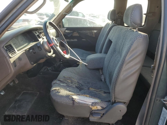 1996 Toyota T100 SR5 z VIN JT4UN24D2T0029466, wystawiony jako Copart lot #57122945 z przebiegiem 421 207 mil mil oraz Szkoda całkowita • Salvage title. Historia ofert i sprzedaży dostępna na DreamBid. Obrazek 7.