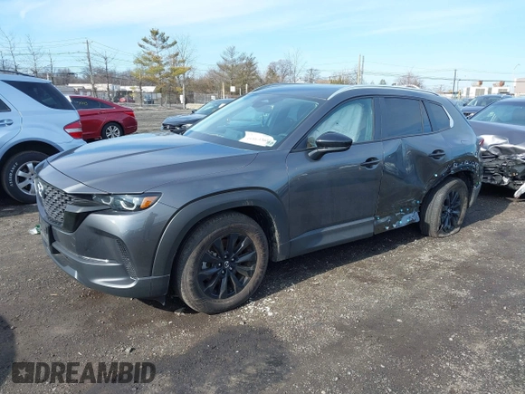 2025 Mazda CX-50 S Premium with VIN 7MMVABDM0SN316760, listed as a IAAI auction lot 41864360 with 6,555 mi miles and . Bid and sale history available at DreamBid. Image 2.