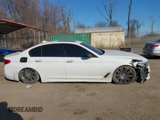 2018 BMW 5 Series M550i xDrive with VIN WBAJB9C53JB036097, listed as a IAAI auction lot 41743031 with 70,164 mi miles and . Bid and sale history available at carsss.com. Image 14.
