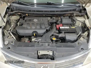 2009 Nissan Versa S z VIN 3N1BC11E69L406027, wystawiony jako Copart lot #50904135 z przebiegiem 163 718 mil mil oraz Szkoda całkowita • Salvage title. Historia ofert i sprzedaży dostępna na DreamBid. Obrazek 11.