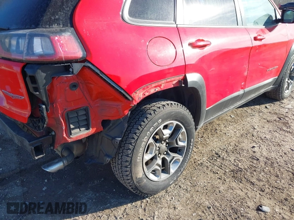 2019 Jeep Cherokee Trailhawk Elite with VIN 1C4PJMBX3KD217437, listed as a IAAI auction lot 41448614 with 85,889 mi miles. Bid and sale history available at carsss.com. Image 17.