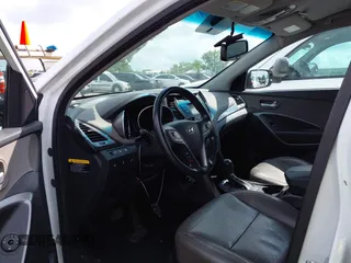 2014 Hyundai Santa Fe with VIN 5XYZUDLB9EG156555, listed as a IAAI auction lot 42721070 with 349,412 mi miles and . Bid and sale history available at DreamBid. Image 17.