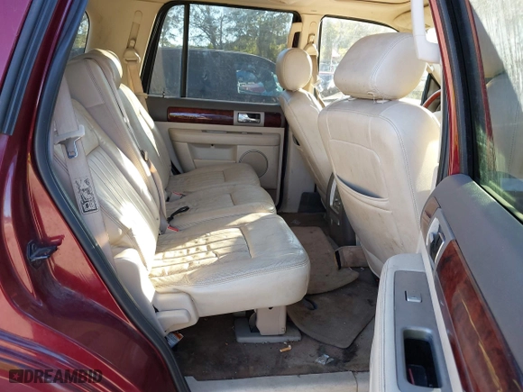 2004 Lincoln Navigator Luxury with VIN 5LMFU27R64LJ13317, listed as a IAAI auction lot 40598909 with 240,131 mi miles. Bid and sale history available at carsss.com. Image 8.