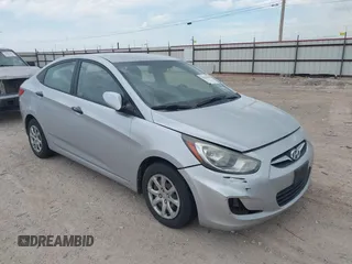 2012 Hyundai Accent GLS z VIN KMHCT4AE8CU095891, wystawiony jako IAAI lot #42256404 z przebiegiem 171 514 mil mil oraz . Historia ofert i sprzedaży dostępna na DreamBid. Obrazek 1.