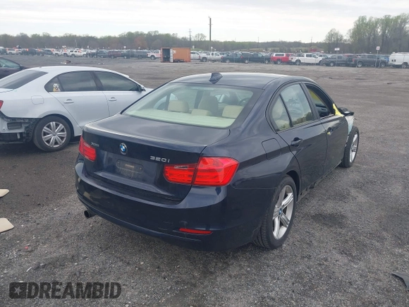 2015 BMW 3 Series 320i xDrive with VIN WBA3C3G5XFNT51305, listed as a IAAI auction lot 42023280 with 127,887 mi miles and . Bid and sale history available at DreamBid. Image 4.