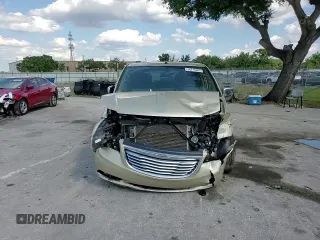 2011 Chrysler Town & Country Limited z VIN 2A4RR6DG5BR746552, wystawiony jako Copart lot #56215685 z przebiegiem 143 505 mil mil oraz Szkoda całkowita • Salvage title. Historia ofert i sprzedaży dostępna na DreamBid. Obrazek 15.