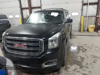 2015 GMC Yukon XL SLT with VIN 1GKS2HKC9FR175011, listed as a IAAI auction lot 41510519 with 194,136 mi miles. Bid and sale history available at carsss.com. Image 12.