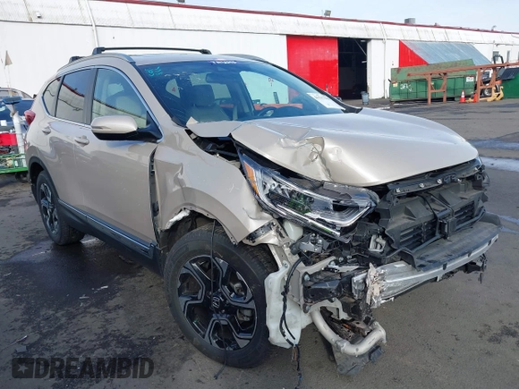 2017 Honda CR-V Touring with VIN 5J6RW2H99HL002127, listed as a IAAI auction lot 41517919 with 18,367 mi miles. Bid and sale history available at carsss.com. Image 1.