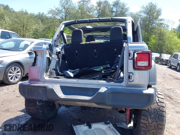 2018 Jeep Wrangler Unlimited Sport S z VIN 1C4HJXDG9JW150509, wystawiony jako IAAI lot #41989409 z przebiegiem Nie podano mil oraz . Historia ofert i sprzedaży dostępna na DreamBid. Obrazek 16.