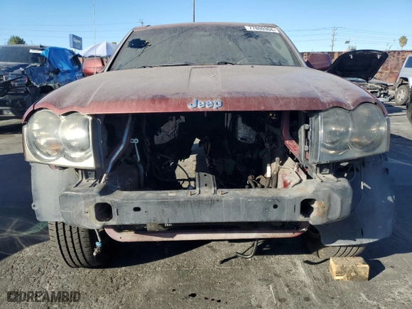 2007 Jeep Grand Cherokee SRT-8 with VIN 1J8HR78347C617760, listed as a Copart auction lot 77800304 with 0 mi miles and Salvage Title. Bid and sale history available at carsss.com. Image 5.