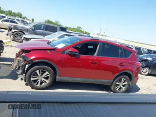 2018 Toyota RAV4 XLE with VIN 2T3WFREV8JW425464, listed as a IAAI auction lot 41977877 with 142,265 mi miles and . Bid and sale history available at carsss.com. Image 14.