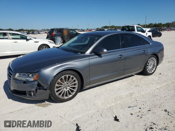 2015 Audi A8 with VIN WAUJGAFD5FN009026, listed as a Copart auction lot 81938904 with 122,880 mi miles and Salvage title. Bid and sale history available at DreamBid. Image 1.