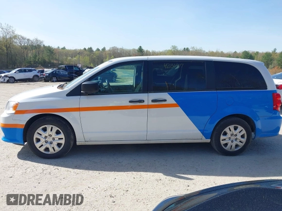 2019 Dodge Grand Caravan SE with VIN 2C4RDGBG8KR646829, listed as a IAAI auction lot 42136947 with 73,015 mi miles and . Bid and sale history available at DreamBid. Image 14.