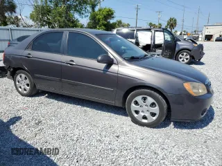 2006 Kia Spectra EX z VIN KNAFE121965370962, wystawiony jako Copart lot #57651215 z przebiegiem 152 308 mil mil oraz Szkody całkowita. Historia ofert i sprzedaży dostępna na DreamBid. Obrazek 4.