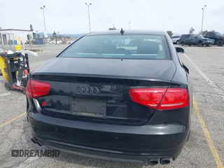 2013 Audi S8 with VIN WAUD2AFD0DN028673, listed as a IAAI auction lot 41689320 with 115,502 mi miles. Bid and sale history available at carsss.com. Image 16.