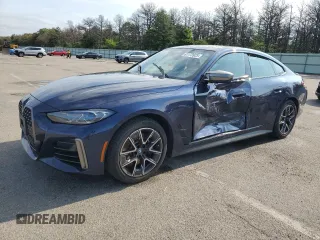 2022 BMW 4 Series M440i xDrive with VIN WBA13AW04NFM50664, listed as a Copart auction lot 61173925 with Not provided miles and Salvage title. Bid and sale history available at DreamBid. Image 1.