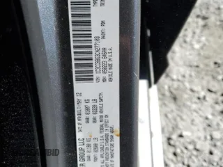 2012 Chrysler 200 Touring with VIN 1C3CCBBG3CN277103, listed as a Copart auction lot 49851595 with 215,000 mi miles and Salvage Title. Bid and sale history available at DreamBid. Image 12.
