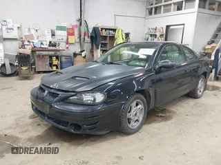2005 Pontiac Grand Am GT with VIN 1G2NW12E85M140434, listed as a IAAI auction lot 41966294 with 142,548 mi miles. Bid and sale history available at carsss.com. Image 2.