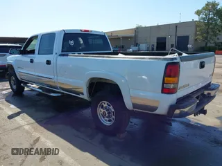 2004 GMC Sierra 2500HD SLE z VIN 1GTHK23U94F238875, wystawiony jako IAAI lot #42162219 z przebiegiem Nie podano mil oraz . Historia ofert i sprzedaży dostępna na DreamBid. Obrazek 3.