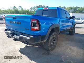 2021 Ram 1500 TRX z VIN 1C6SRFU91MN900450, wystawiony jako IAAI lot #42102724 z przebiegiem 80 071 mil mil oraz . Historia ofert i sprzedaży dostępna na DreamBid. Obrazek 4.
