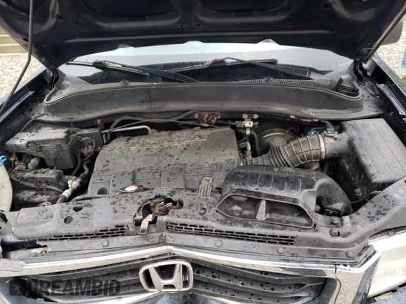 2012 Honda Ridgeline RT with VIN 5FPYK1F27CB454710, listed as a Copart auction lot 57634595 with 168,131 mi miles and Salvage title. Bid and sale history available at DreamBid. Image 11.