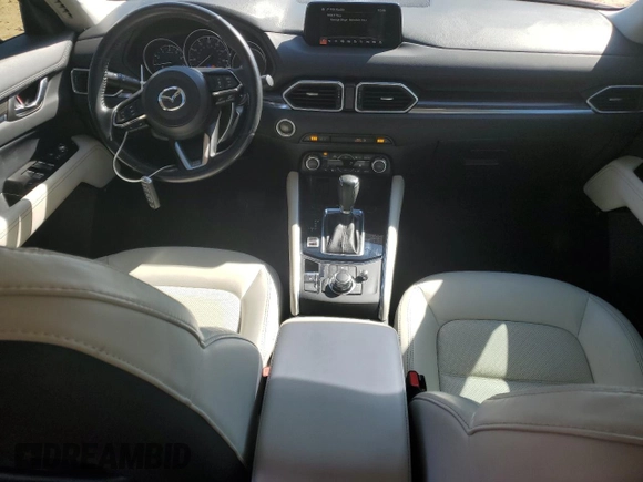 2018 Mazda CX-5 Grand Touring with VIN JM3KFADM5J0350937, listed as a Copart auction lot 46525965 with 59,478 mi miles and Salvage Title. Bid and sale history available at DreamBid. Image 8.