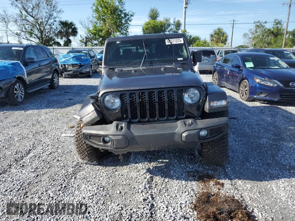2021 Jeep Gladiator Willys with VIN 1C6HJTAG0ML615446, listed as a Copart auction lot 60571375 with 62,174 mi miles and Salvage title. Bid and sale history available at DreamBid. Image 5.
