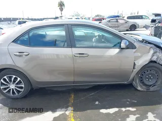 2019 Toyota Corolla L with VIN 5YFBURHE8KP892394, listed as a IAAI auction lot 41917095 with 89,073 mi miles. Bid and sale history available at carsss.com. Image 14.
