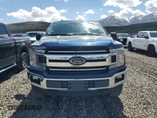 2018 Ford F-150 XL with VIN 1FTEW1E53JKE15690, listed as a Copart auction lot 54586685 with 165,730 mi miles and Clean title. Bid and sale history available at DreamBid. Image 5.
