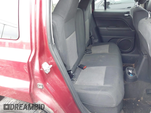 2014 Jeep Patriot Latitude with VIN 1C4NJRFB6ED892819, listed as a IAAI auction lot 42053389 with 92,213 mi miles and . Bid and sale history available at carsss.com. Image 8.