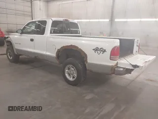 1999 Dodge Dakota SLT with VIN 1B7GG22XXXS254782, listed as a IAAI auction lot 41847644 with 164,607 mi miles and . Bid and sale history available at carsss.com. Image 3.